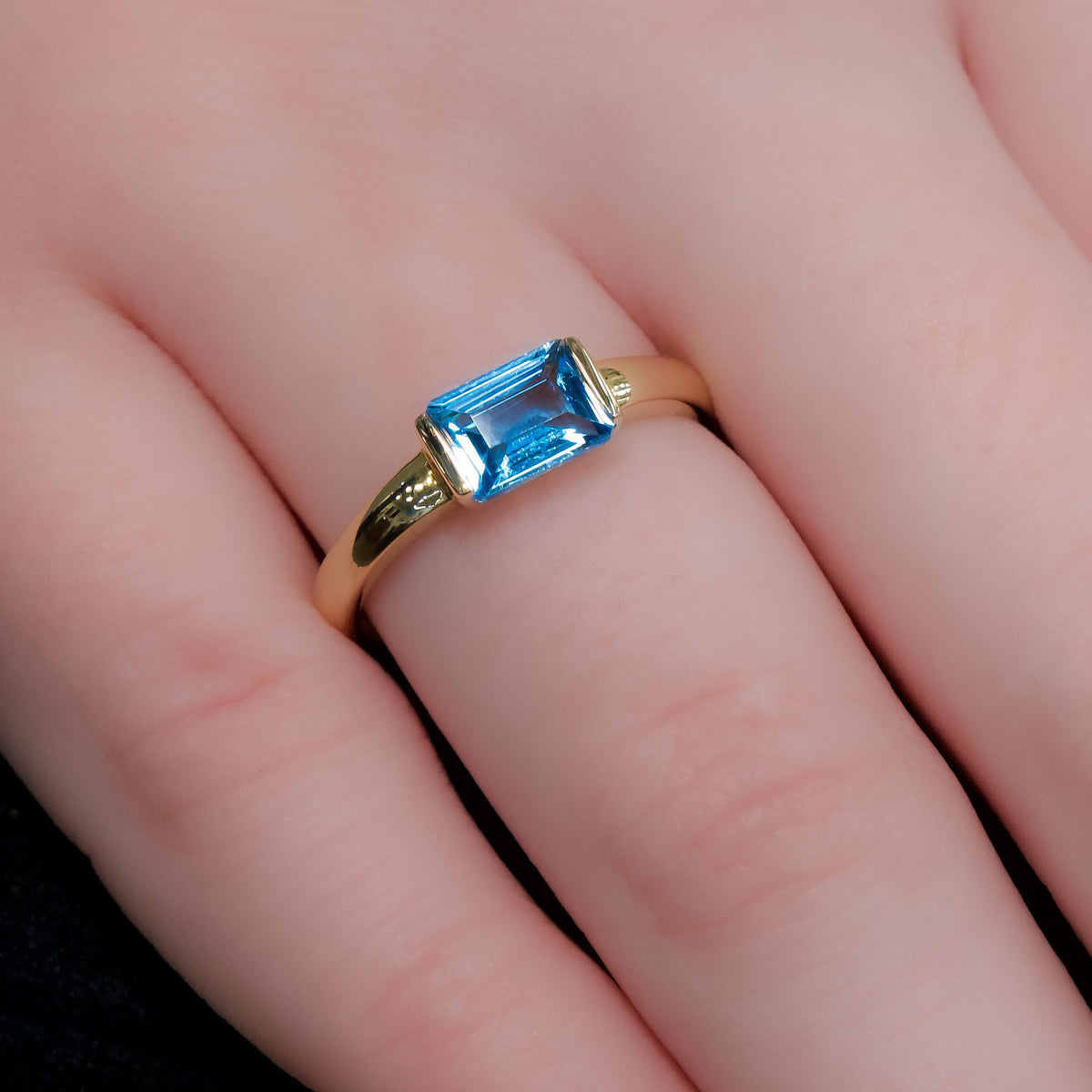 14kt Yellow Gold & 1.15 ct Emerald Cut Blue Topaz East-West Ring 5.5,6,6.5,7,7.5