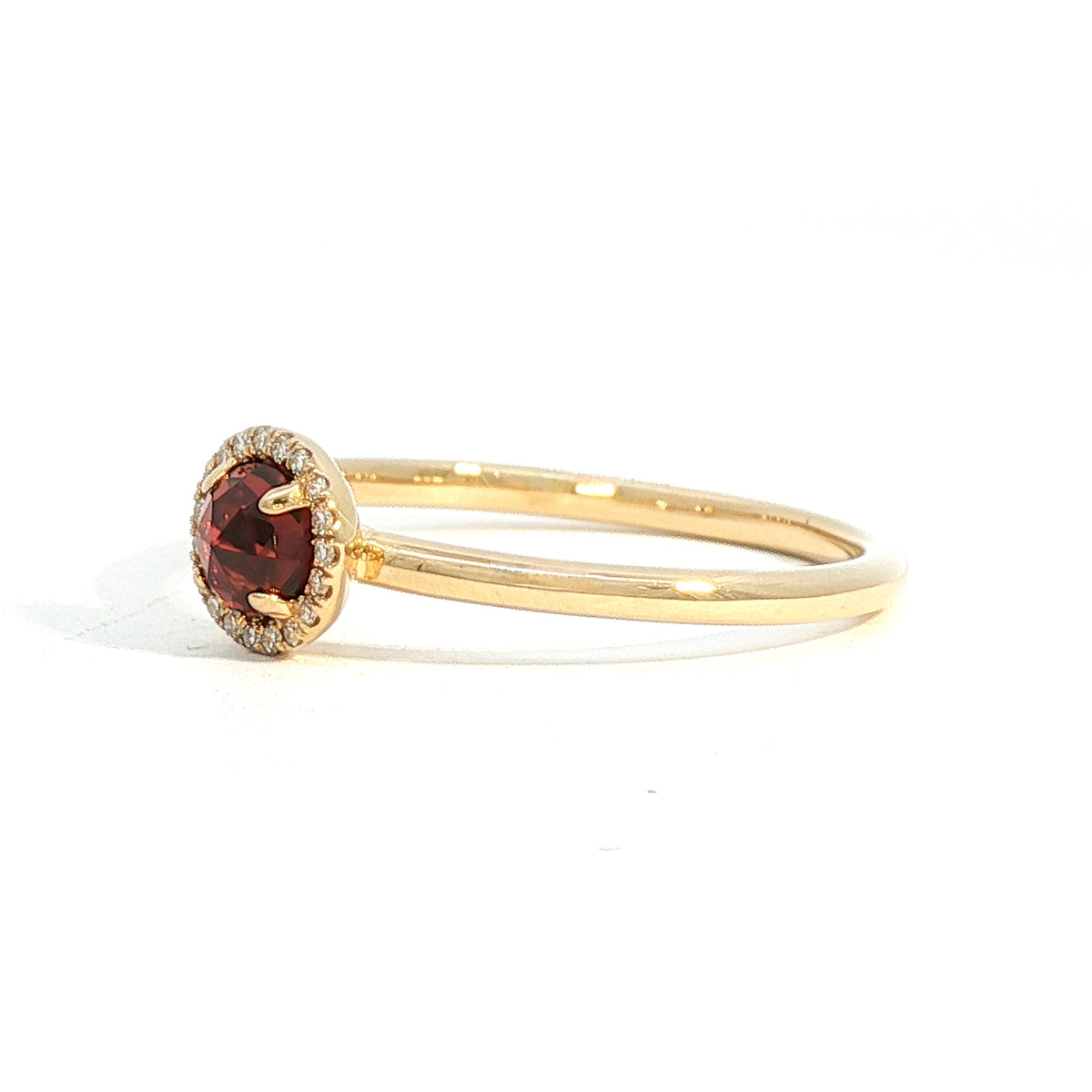 14kt Gold Garnet and Diamond Halo Ring Yellow / 4,Yellow / 4.5,Yellow / 5,Yellow / 5.5,Yellow / 6,Yellow / 6.5,Yellow / 7,Yellow / 7.5,Yellow / 8,Yellow / 8.5,Yellow / 9,White / 4,White / 4.5,White / 5,White / 5.5,White / 6,White / 6.5,White / 7,White / 7.5,White / 8,White / 8.5,White / 9
