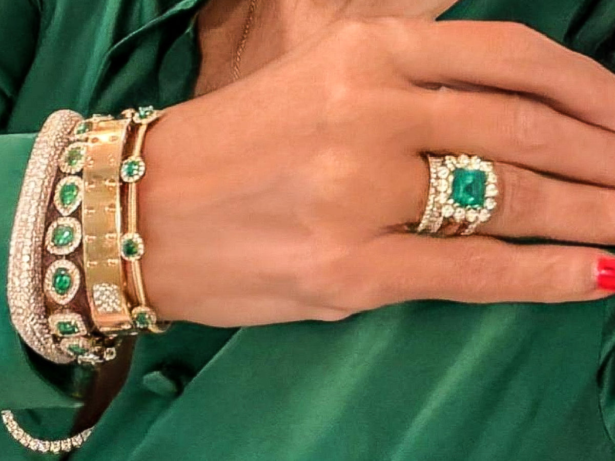 18kt White & Yellow Gold  9.73 ctw Emerald & 2.43 ctw Diamond Halo Bracelet