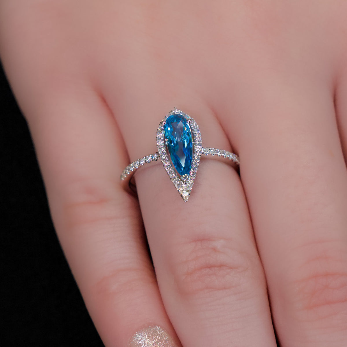 14kt White Gold & .80 ct Pear Shaped Blue Topaz with .21 ctw Diamond Halo Ring 5.5,6,6.5,7,7.5