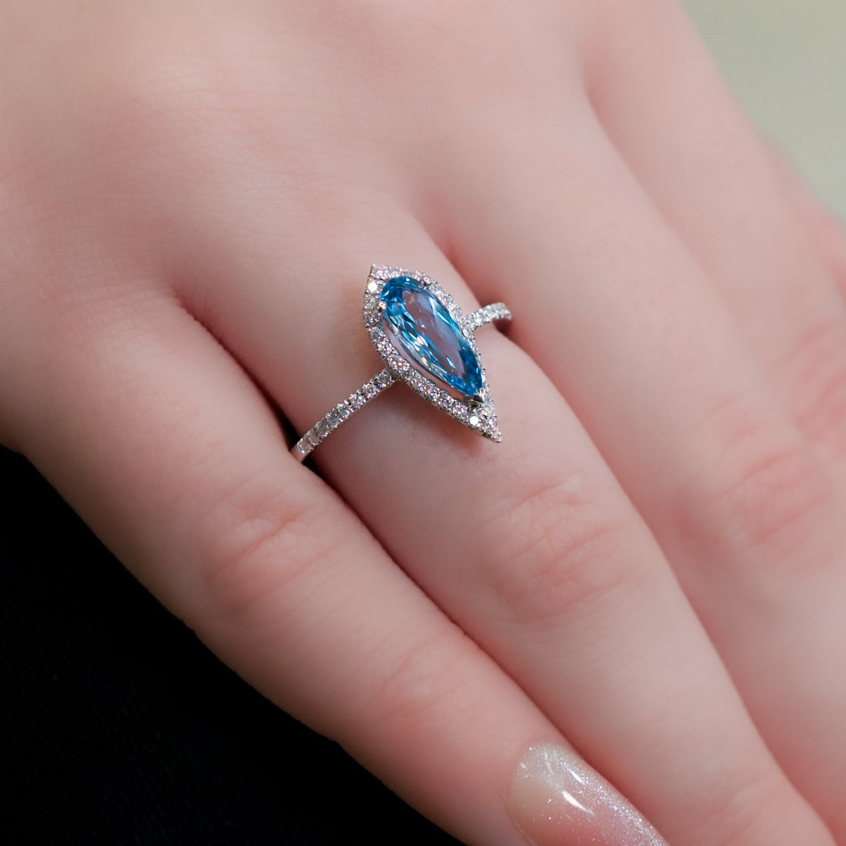 14kt White Gold & .80 ct Pear Shaped Blue Topaz with .21 ctw Diamond Halo Ring 5.5,6,6.5,7,7.5